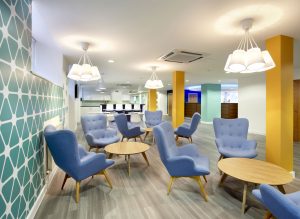 a colourful office breakout area