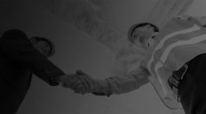 a close-up of people shaking hands